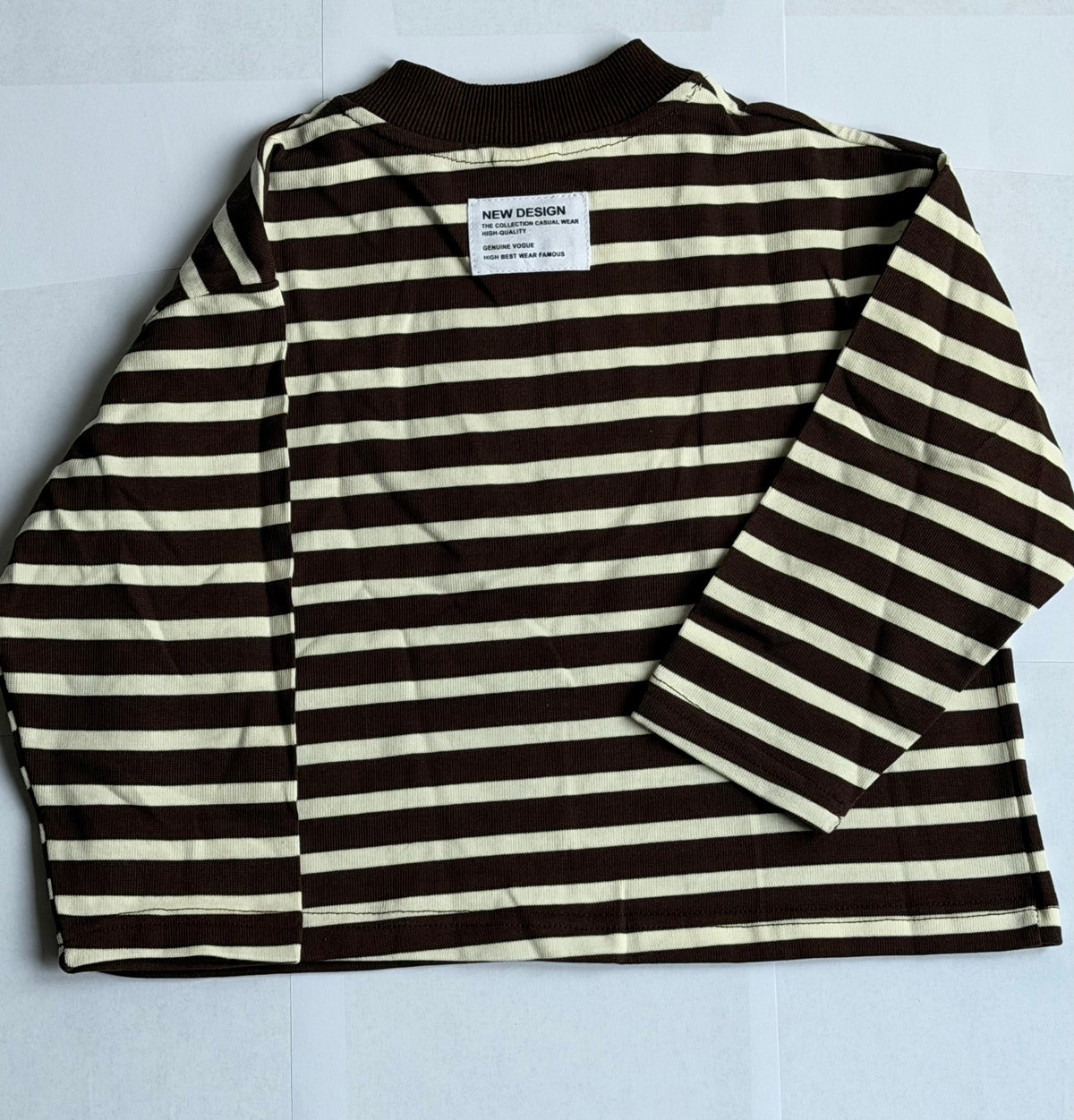 Pull zippé rayé