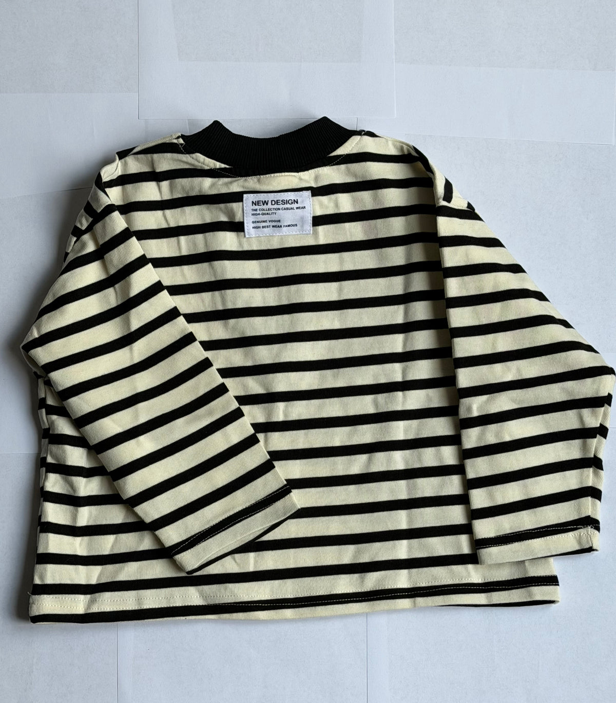 Pull zippé rayé