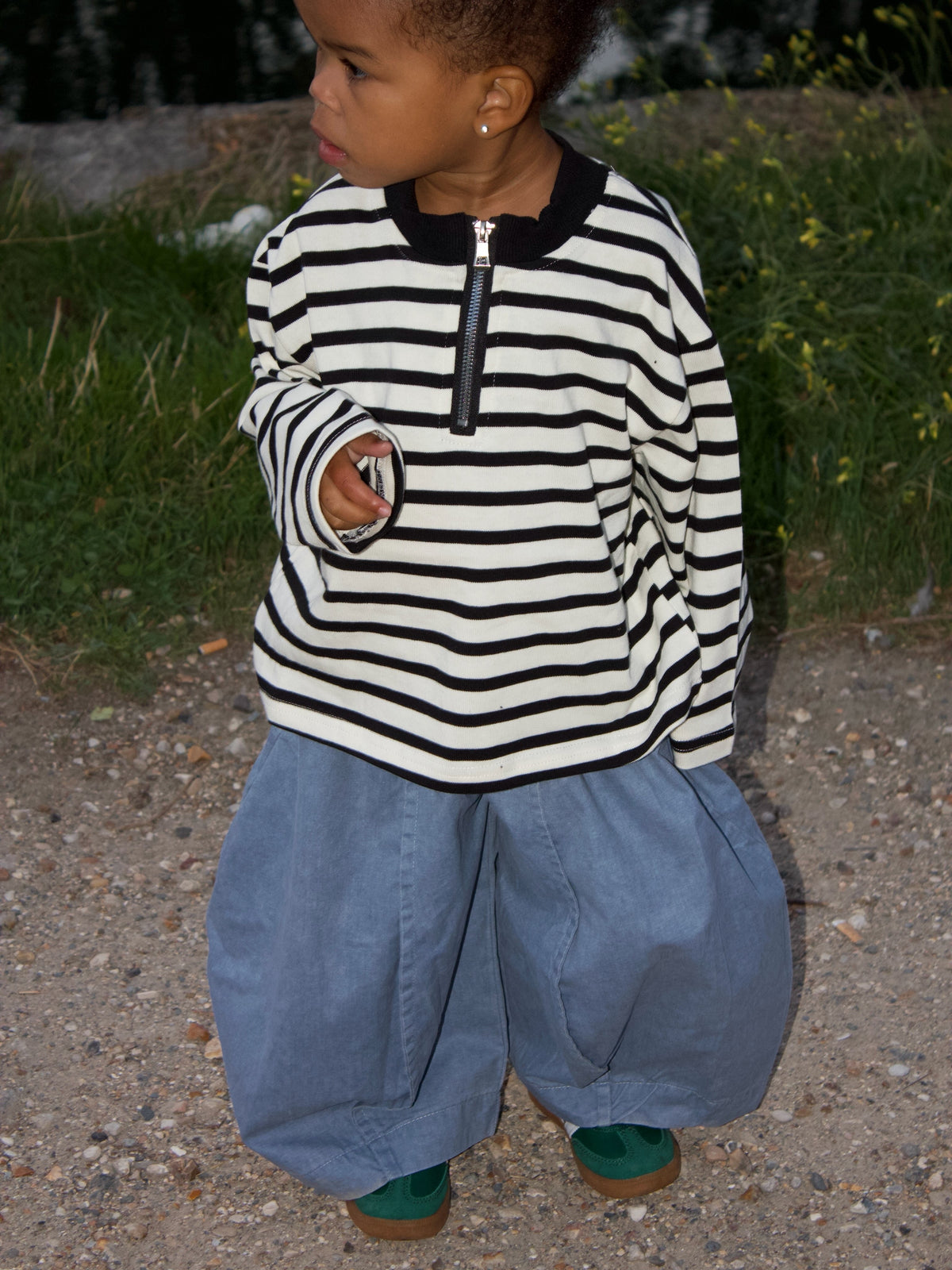 Pull zippé rayé