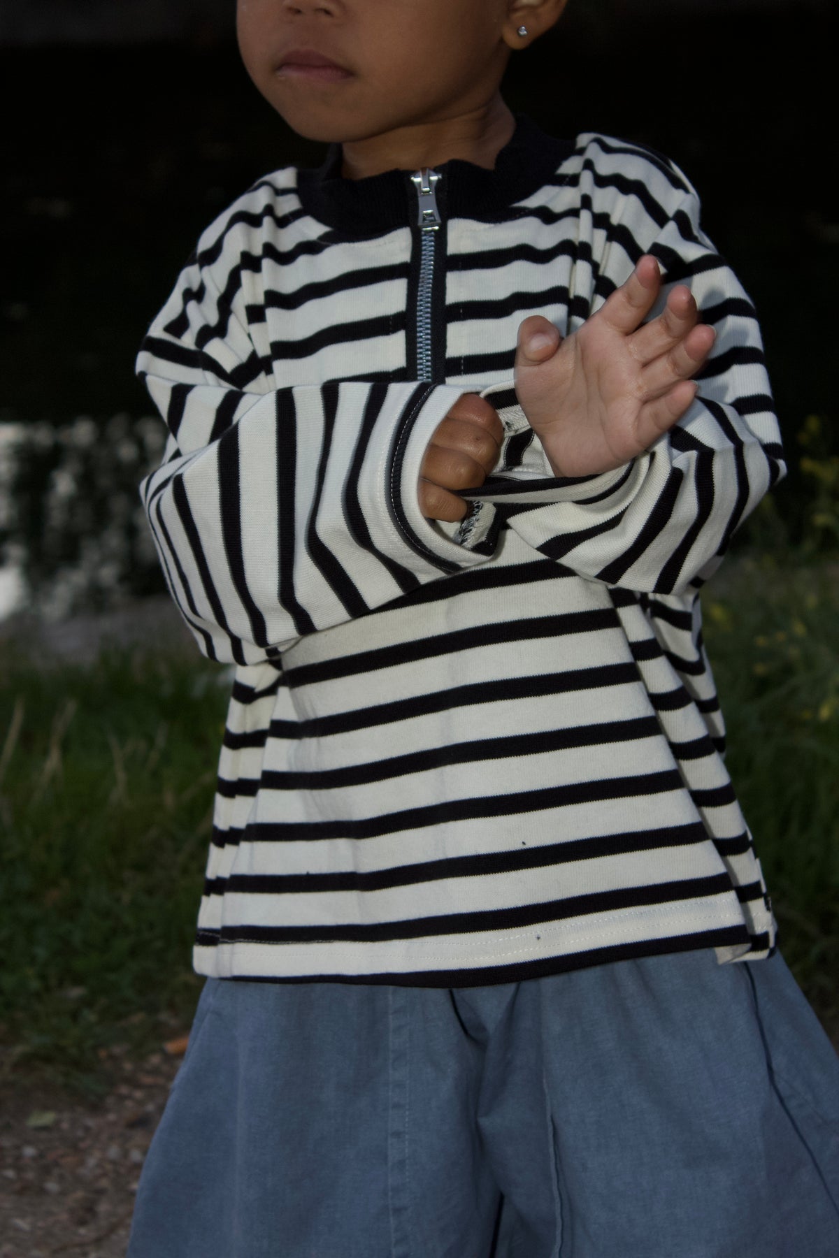 Pull zippé rayé